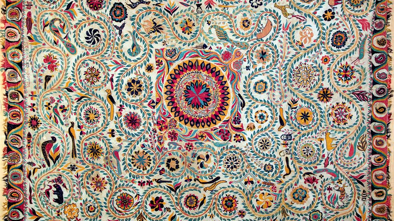 Late 19th century nakshi kantha in cotton, hand embroidered with faces of Bengali poet and playwright Michael Madhusudan Dutt in different corners by Hemchandra Dutt (as signed). Collection: Weavers Studio Resource Centre, Kolkata
