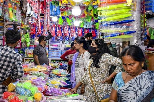 Shoppers stock up on fryums and festive treats ahead of Holi celebrations, in Prayagraj