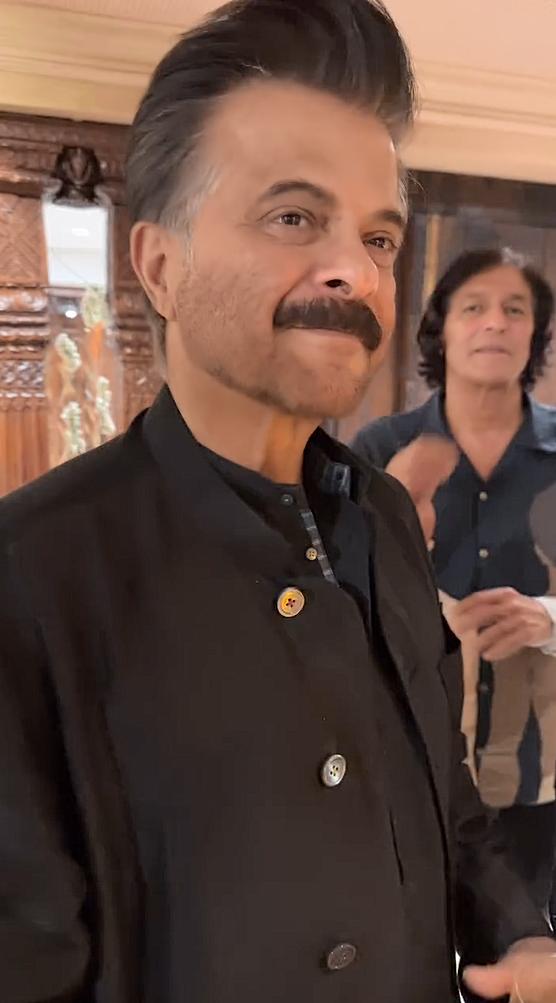 Anil Kapoor looked dashing in a black ethnic outfit.