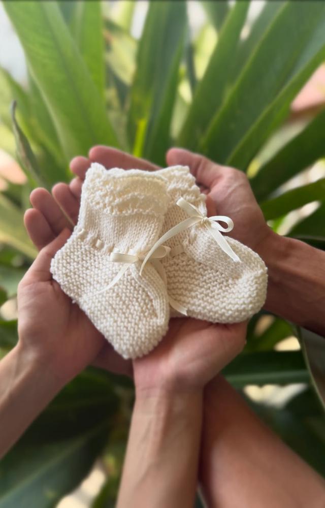 In a collaborative post, Kiara and Sidharth shared a picture of them holding baby socks while making the announcement