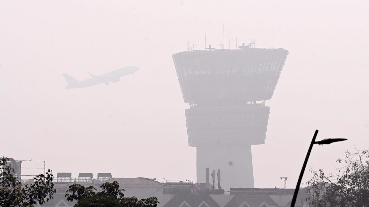 Despite soaring temperatures, a haze blankets the air traffic control (ATC) tower at Mumbai airport, Vile Parle, on January 15. Pic/Ashish Raje