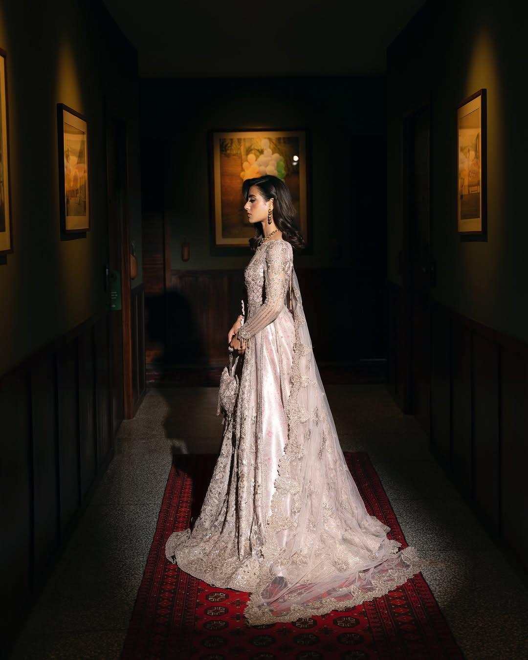 The first and most stunning appearance of Iqra Aziz came in a beautiful white heavily embroidered lehenga set paired with a sheer dupatta.