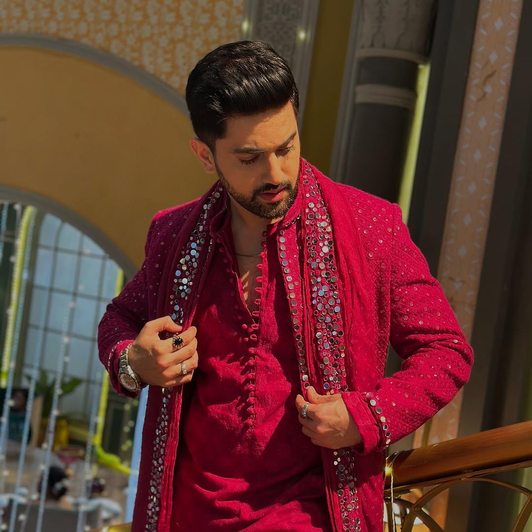 The actor wore a red kurta and paired it with a heavily embroidered matching sherwani. In this look, the actor looked quite smart