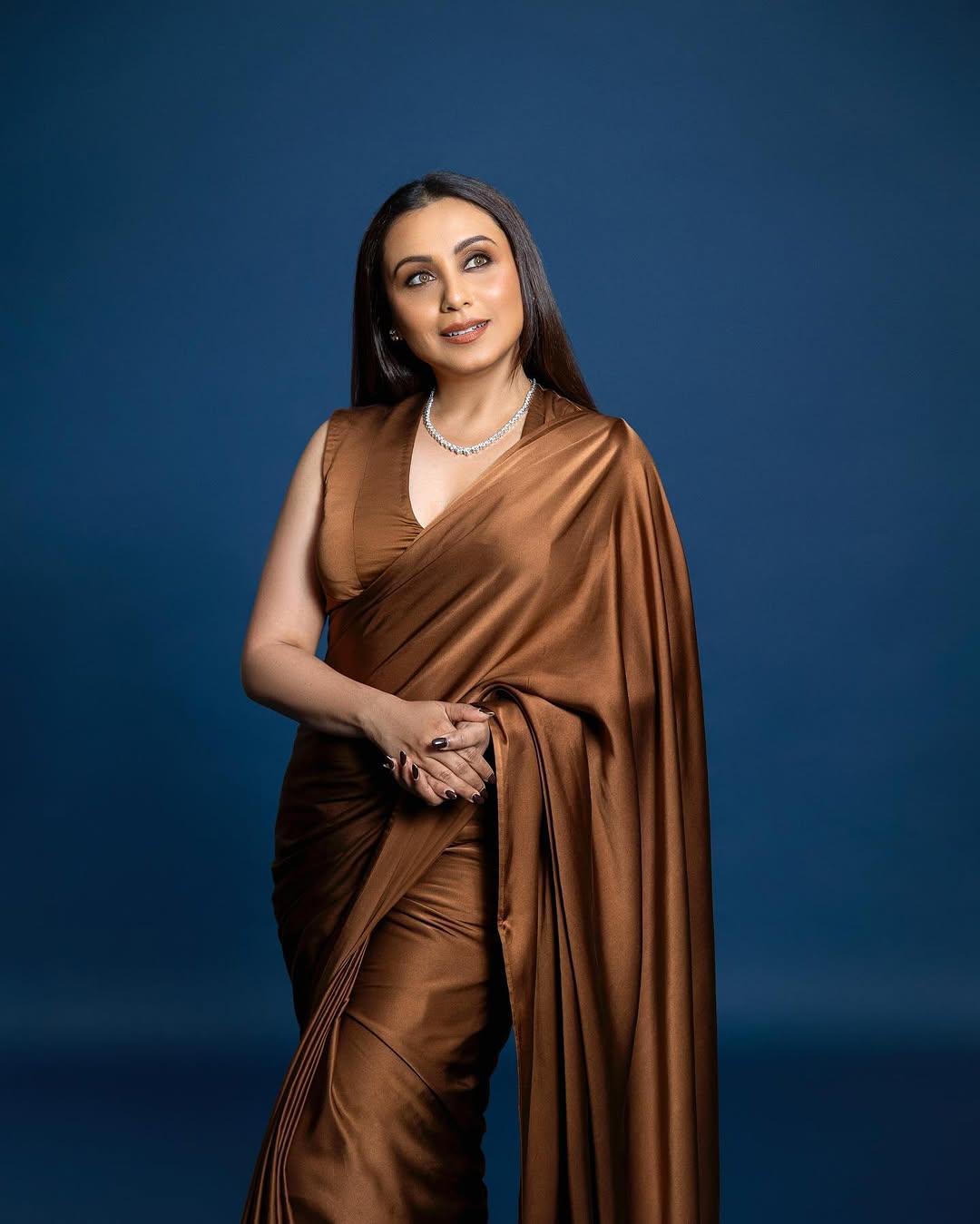 In this look, the actress stunned in a beautiful brown saree that she paired with a matching blouse featuring short sleeves