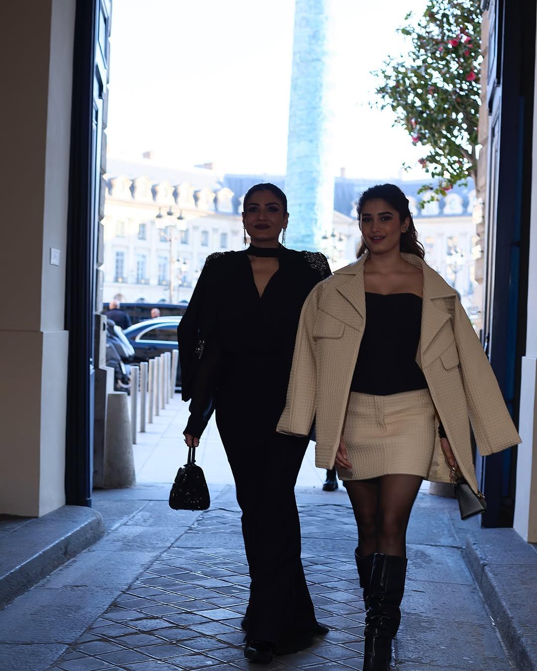 To give her look a complete and bossy touch, Rasha paired her outfit with a stylish beige blazer.