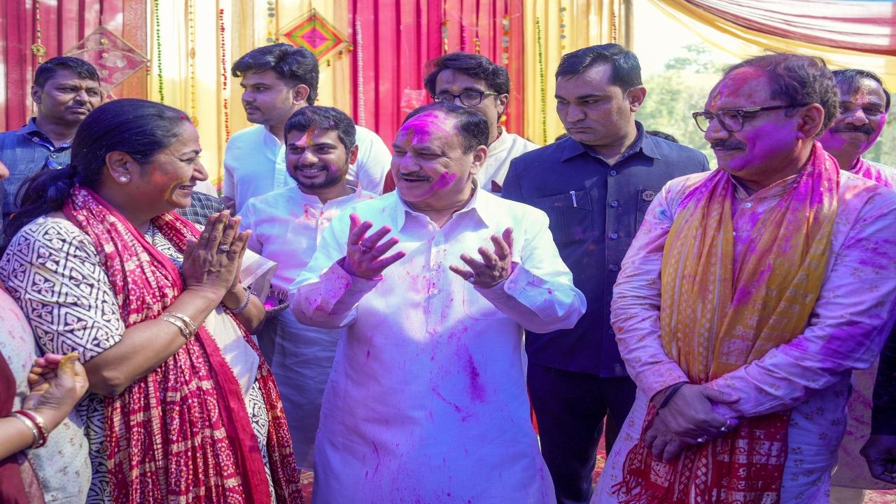 Delhi CM Rekha Gupta, BJP chief JP Nadda and state president Virendra Sachdeva exchanged Holi greetings at the party office in the national capital 