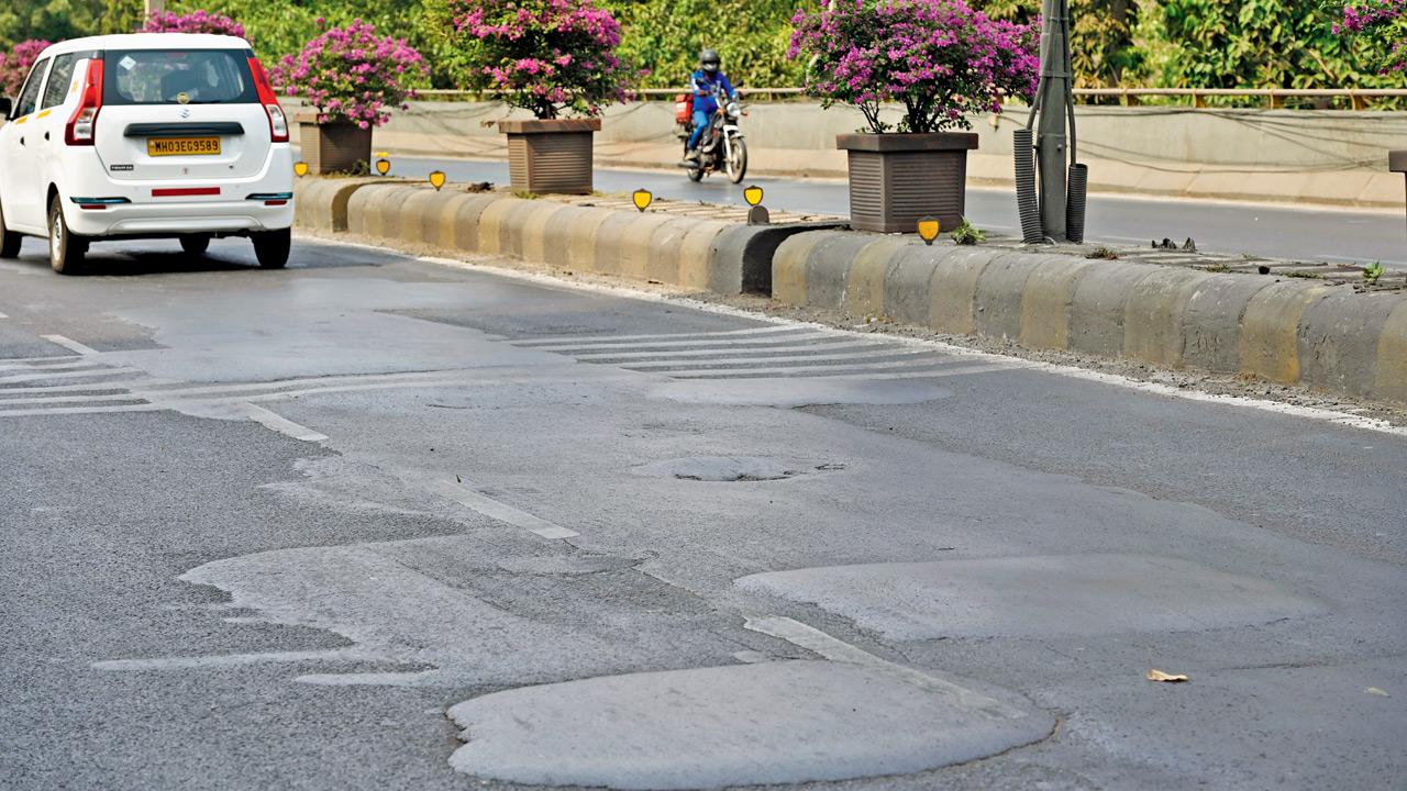 Patchy repairs on the Lalbaug flyover make driving a daily challenge for motorists. Pics/Ashish Raje