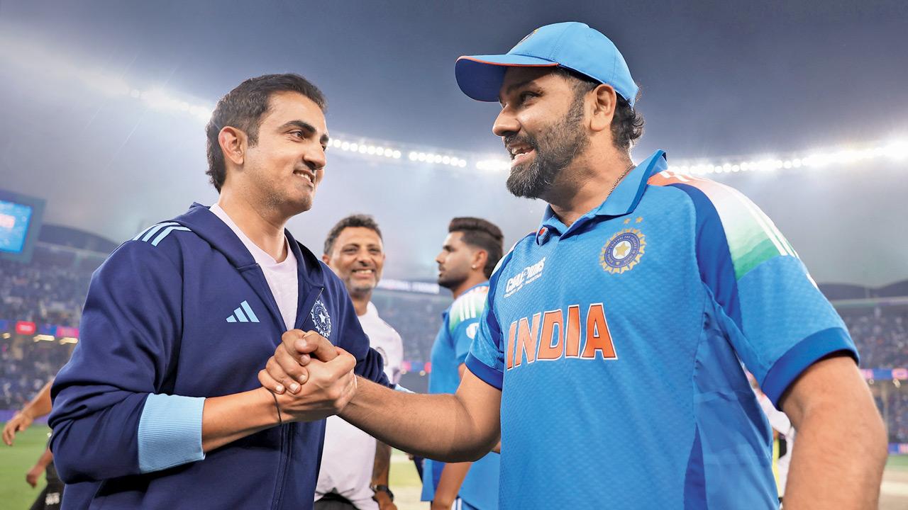 India head coach Gautam Gambhir (left) and skipper Rohit Sharma after their win over NZ yesterday. Pic/Getty Images
