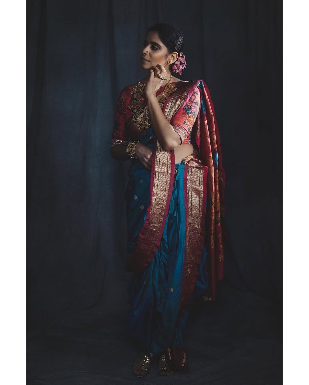 If you haven't found the perfect Gudi Padwa look inspiration yet, then we bet this is what you are looking for. In this picture, Sai stole the limelight in a beautiful blue saree