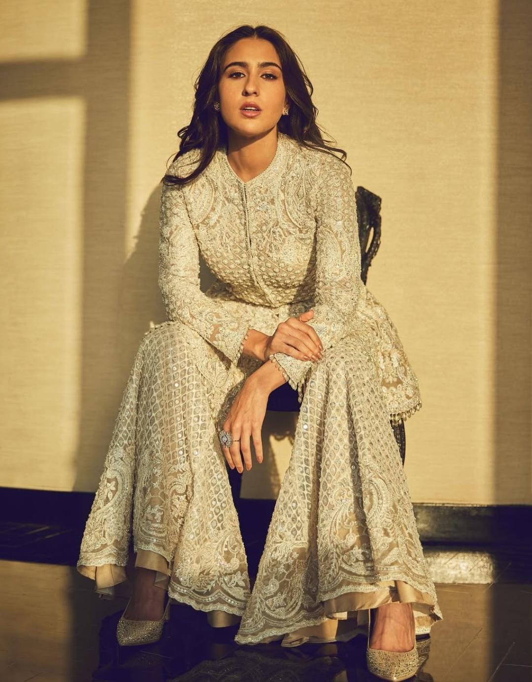 Sara Ali Khan made a striking statement in a heavily embroidered, full-sleeve kurti with a covered neck, giving a refined and regal appeal