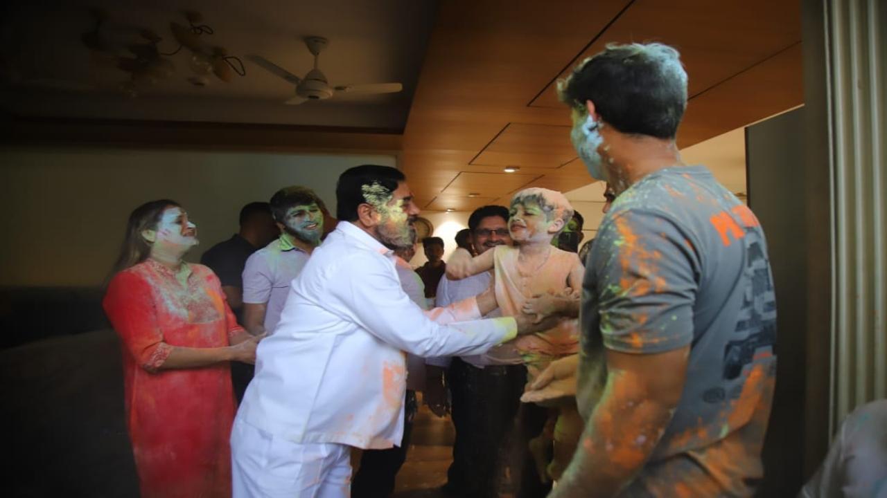 Maharashtra Deputy CM Eknath Shinde plays Holi with grandson Rudransh