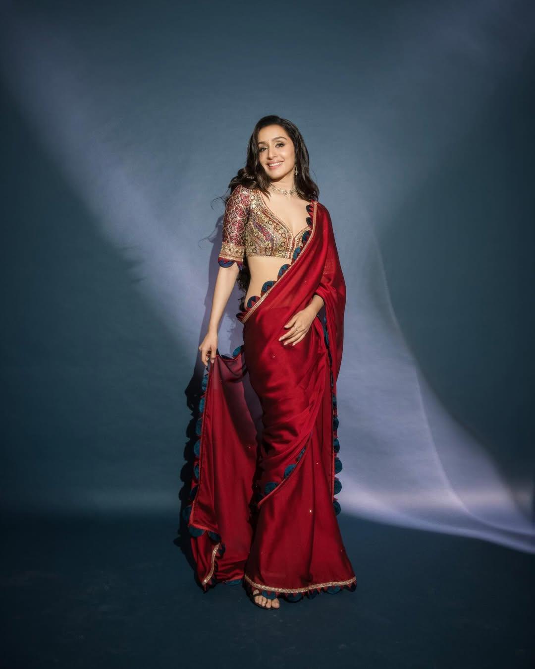 If you want to go a little OTT to impress someone, why not wear a stunning red saree with a stylish border and a heavily embroidered blouse?