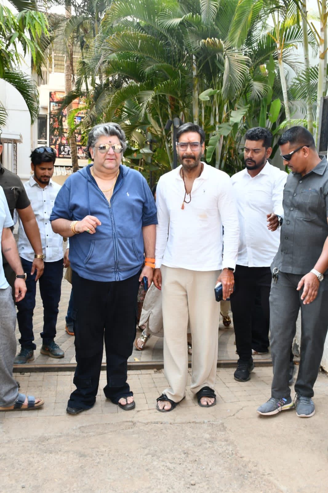 Ajay Devgn looked dashing in a white shirt paired with brown pants as he was clicked in the city