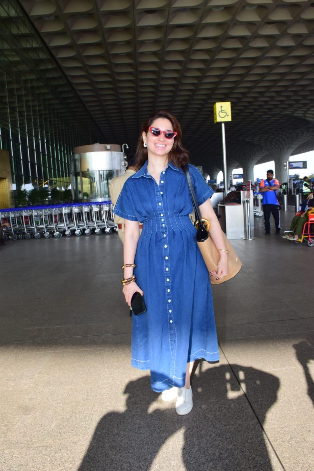 Tamannaah Bhatia looked beautiful in an A-line blue dress as she was clicked at Mumbai airport.