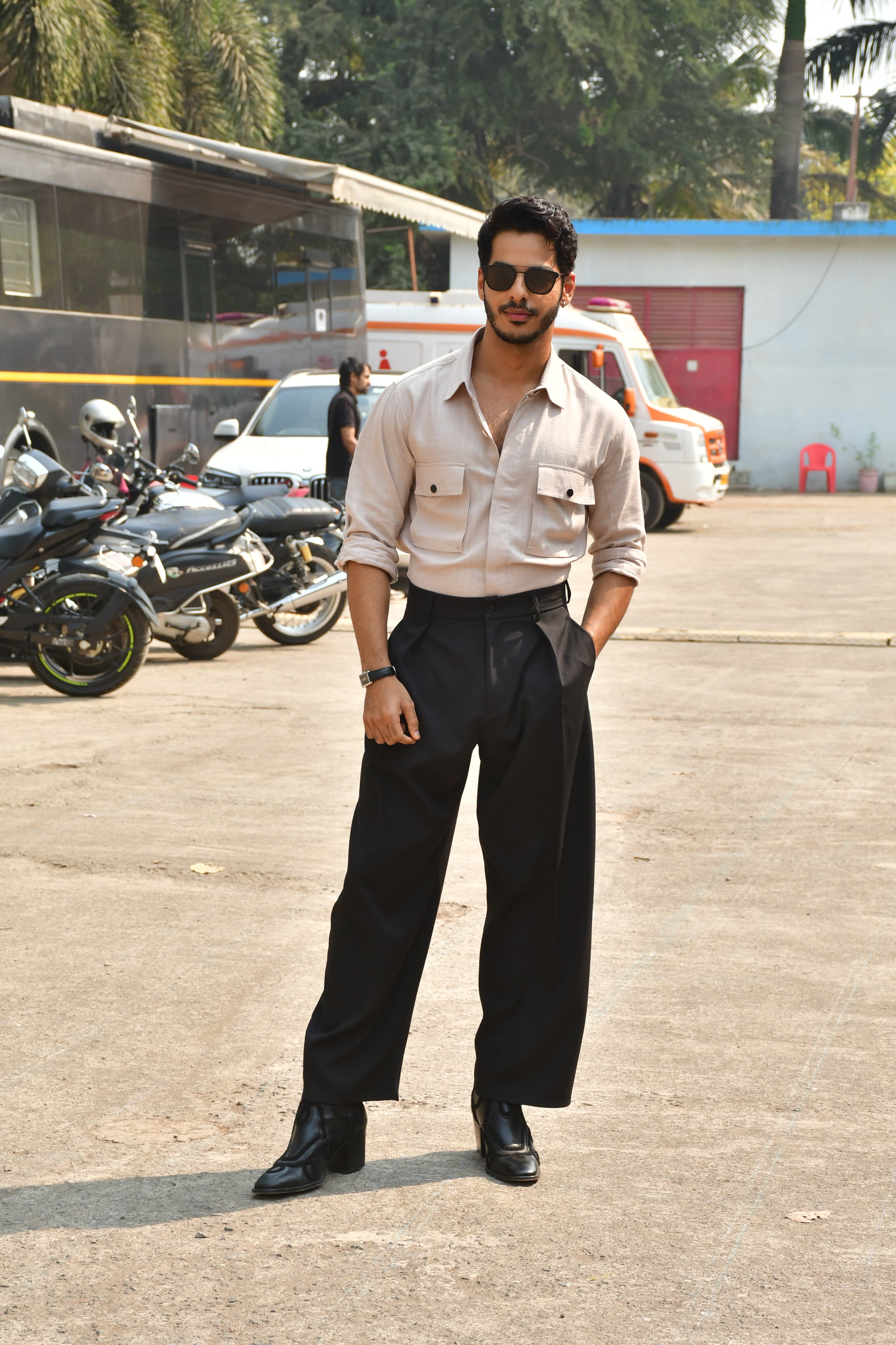 Ishaan Khatter looked smart in a beige shirt. The actor paired his stylish shirt with contrasting black pants.  