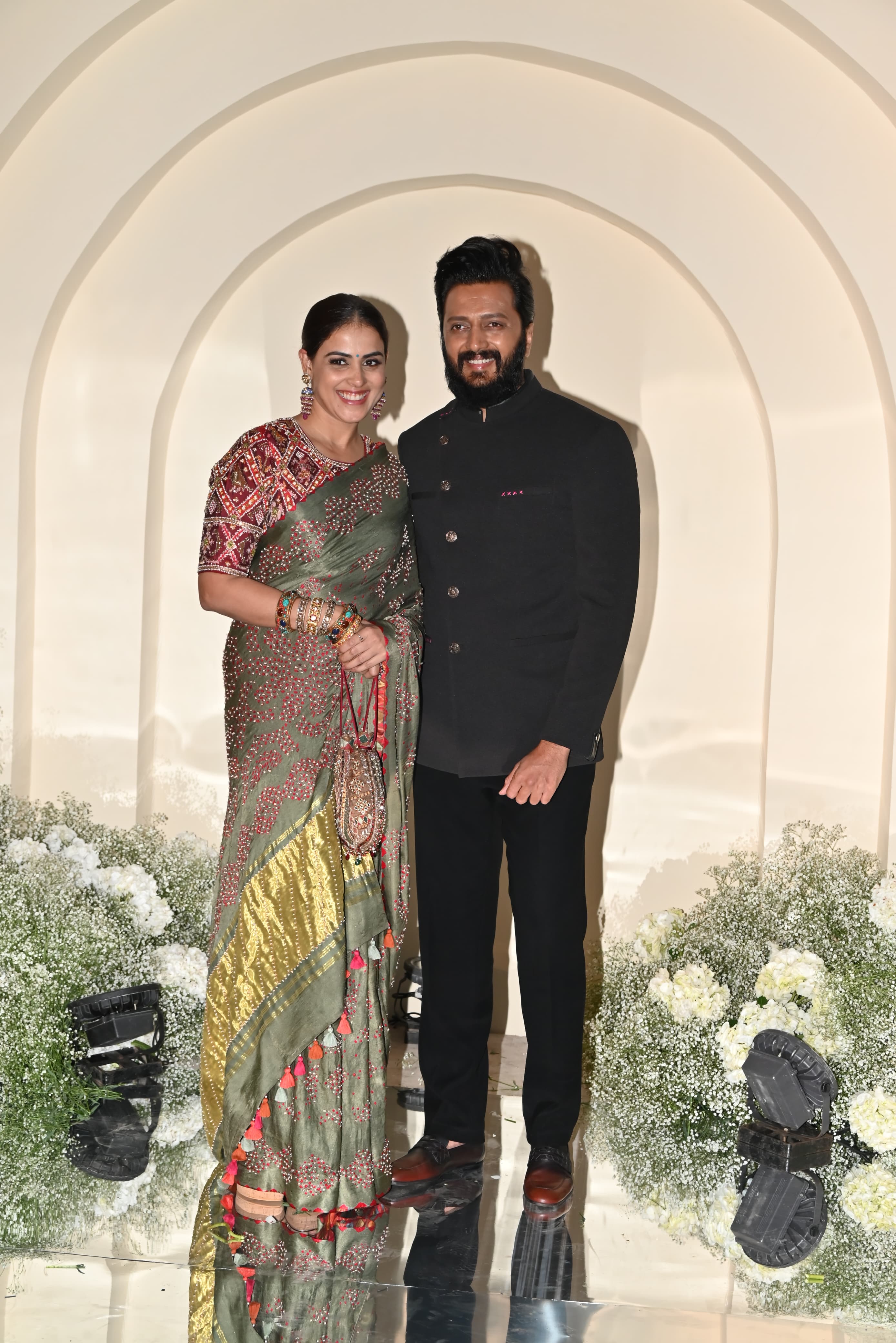 Riteish Deshmukh and Genelia D'Souza looked glamorous and gave major couple goals as they attended Ashutosh and Sunita Gowariker’s son Konark Gowariker and Niyati Kanakia’s star-studded wedding reception