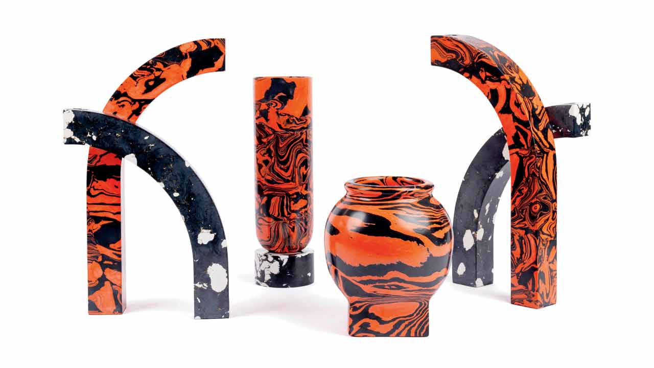 A red and black vase collection form part of the  exhibition