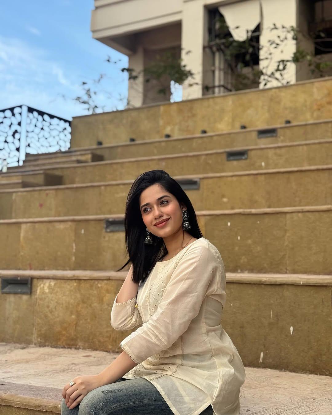 In this look, the actress wore a pretty white-coloured short cotton kurti—the coolest fit for summers—and paired it with stylish jeans.