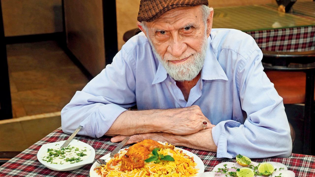 Sayed Safar Ali with a plate of chicken biryani. Pic/Satej Shinde