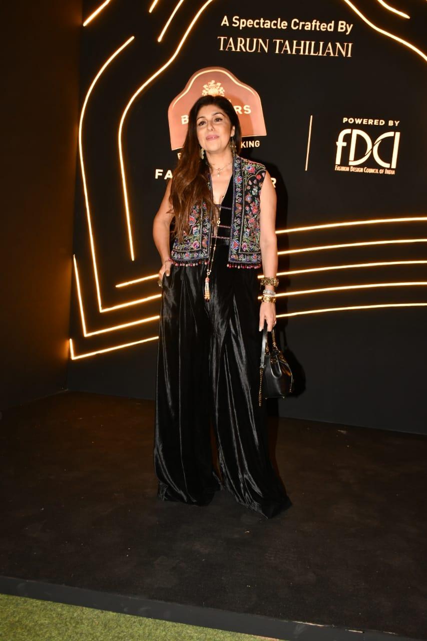 Anaita Shroff embraced a Punjabi aesthetic with her black outfit, adding a Gujarati touch with a multicolored embroidered jacket