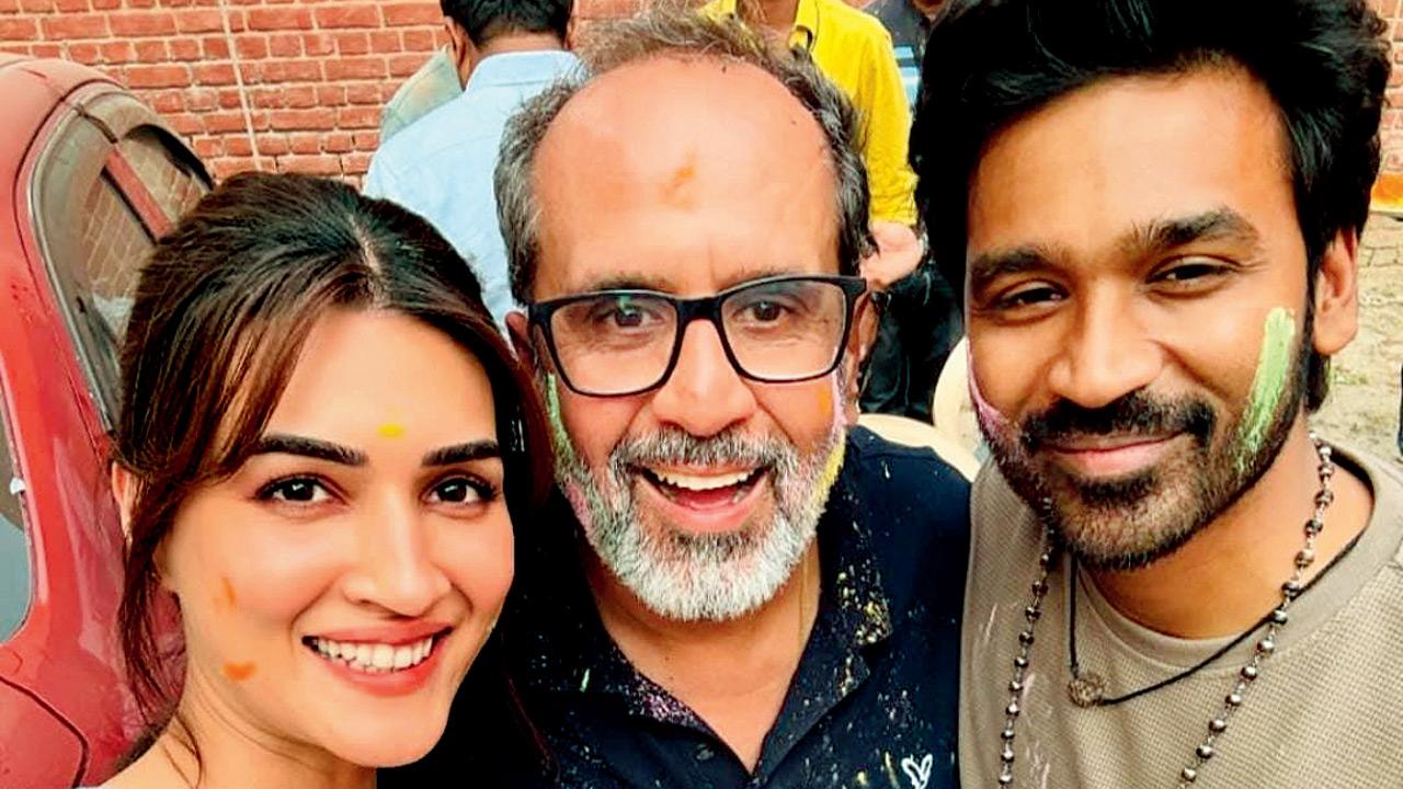 (From left) Kriti Sanon, Aanand L Rai, and Dhanush
