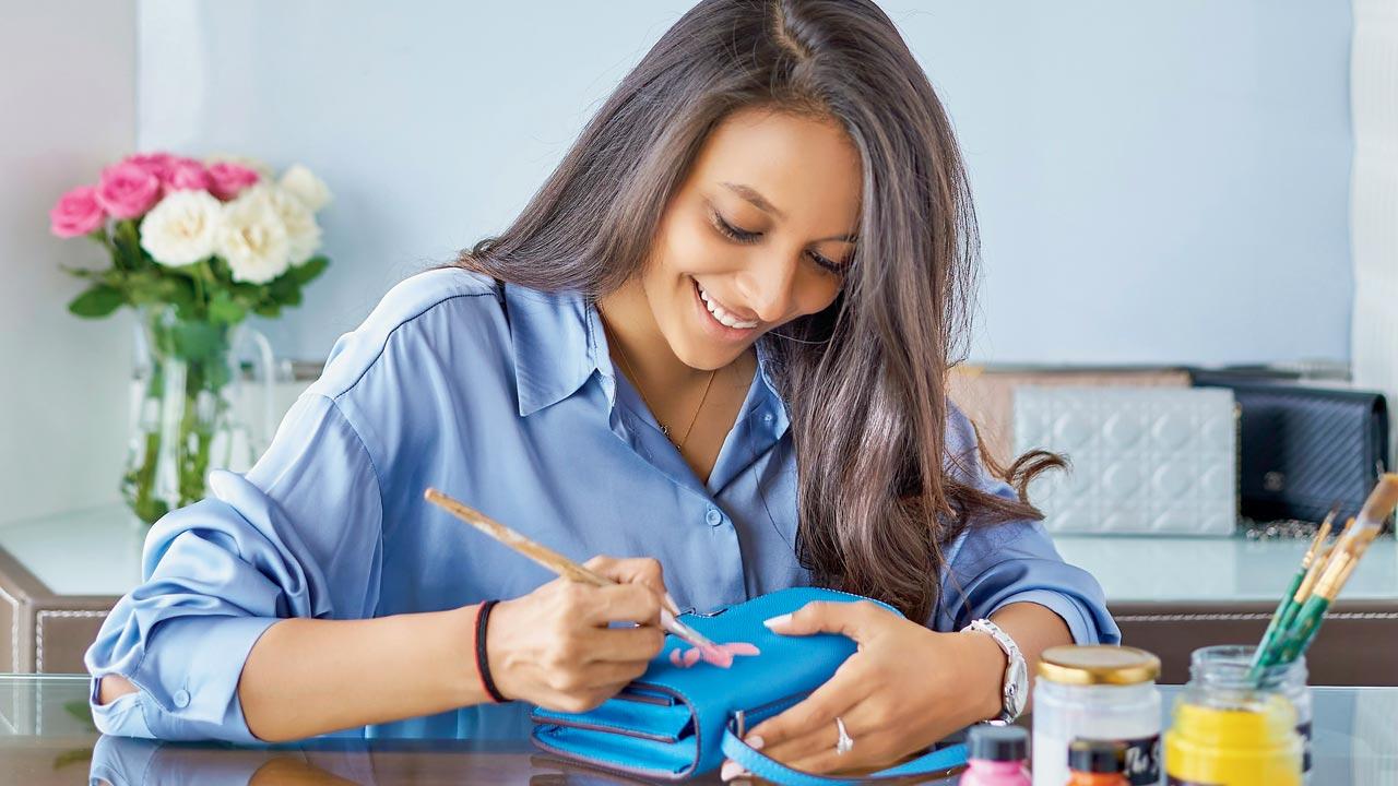 Ranka Adani transforms luxury accessories into bespoke wear. Her list of clients includes the likes of Virat Kohli, who was snapped at the airport carrying a Louis Vuitton duffle bag hand-painted by Adani 