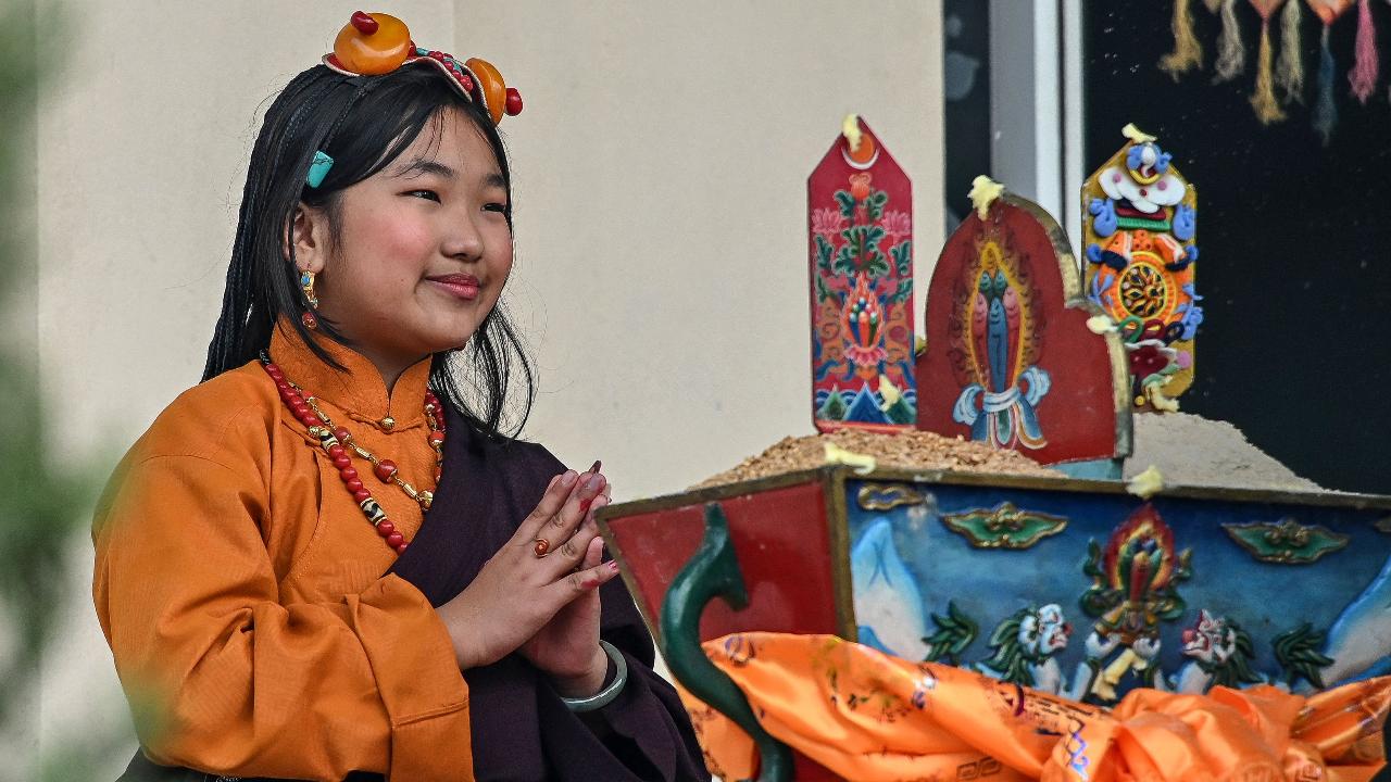 A young Tibetan in exile attends the celebrations of the Lhosar festival marking the start of Tibetan New Year