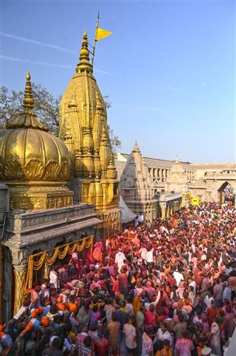 Joy and devotion blend as devotees celebrate Holi at Kashi Vishwanath temple, in Varanasi