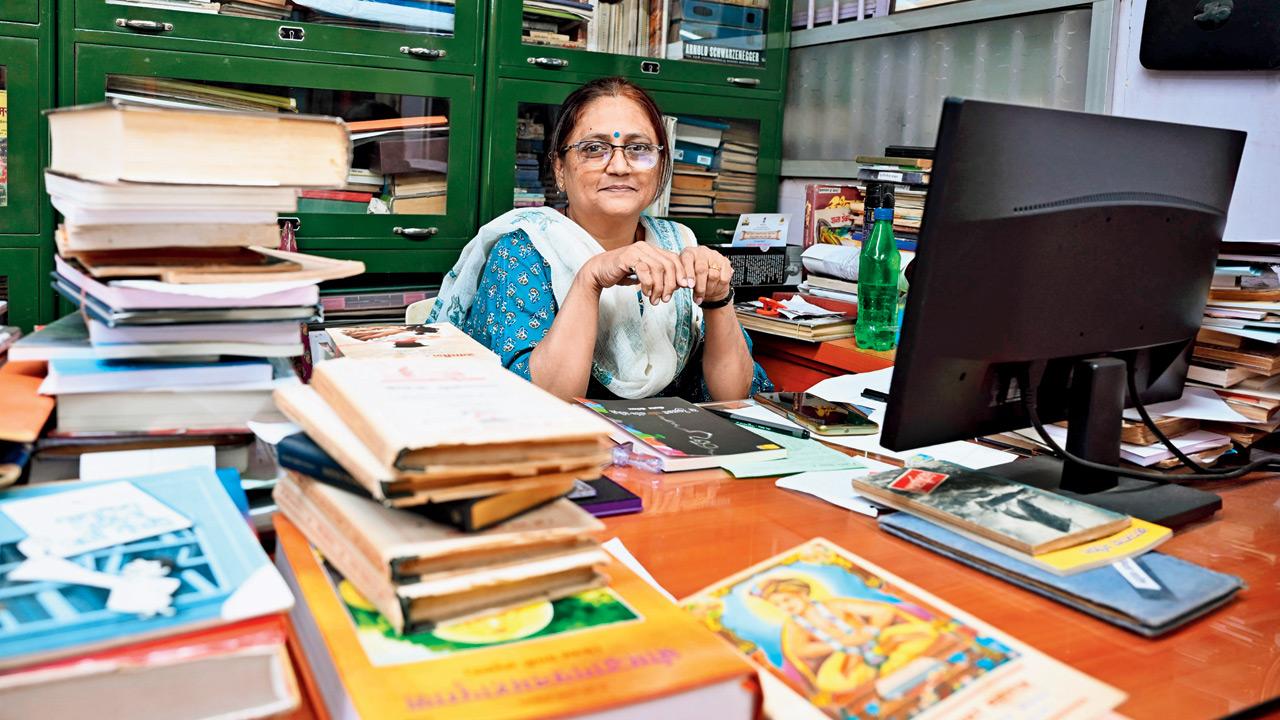 Librarian Manjiri Vaidya at her desk 