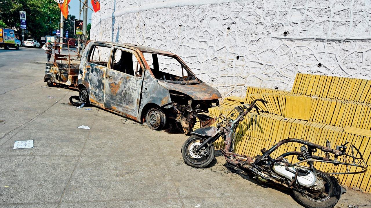The car and bike were charred in the incident