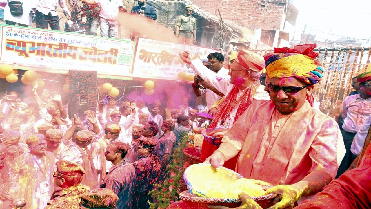 Uttar Pradesh Chief Minister Yogi Adityanath started the Holi celebration at the Gorakhnath temple on Friday