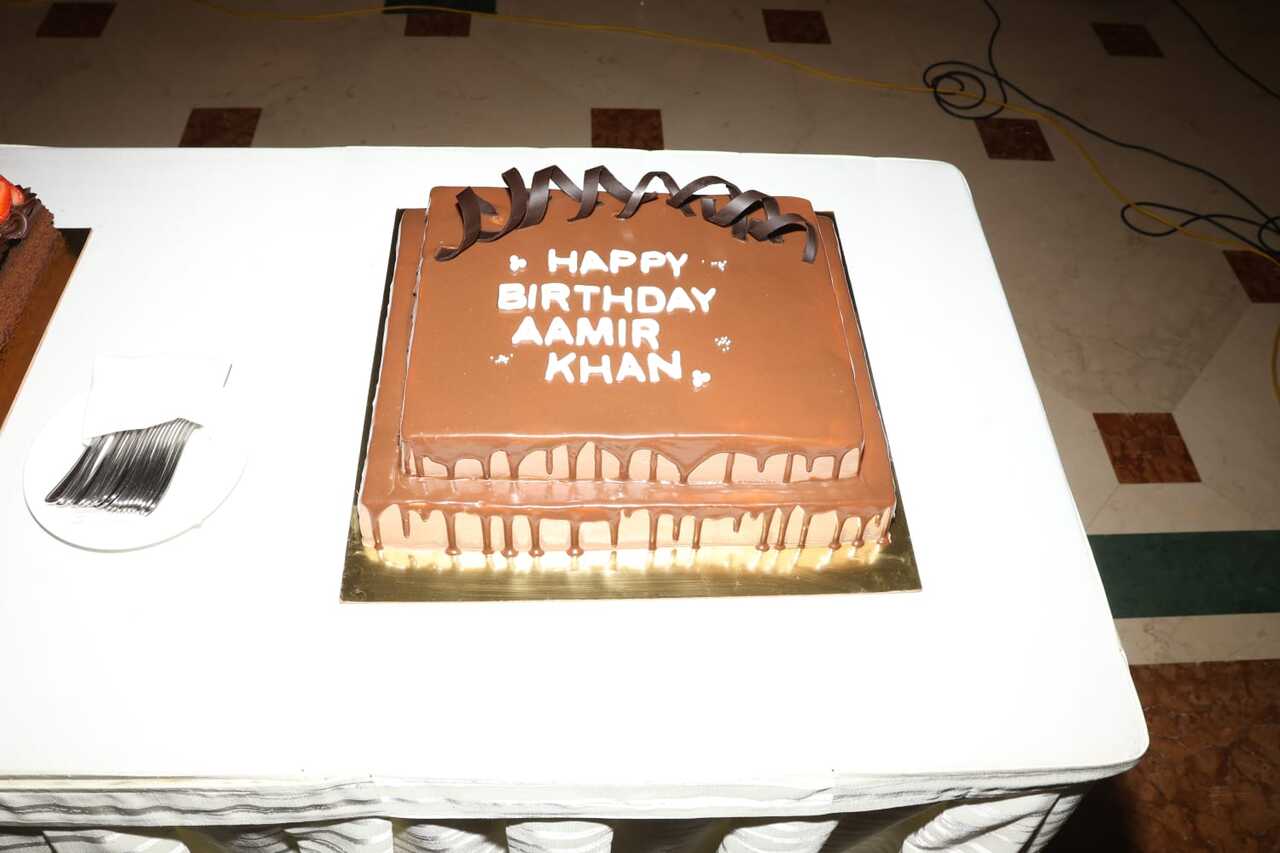 Aamir's birthday cake he cut with the media and also fed them