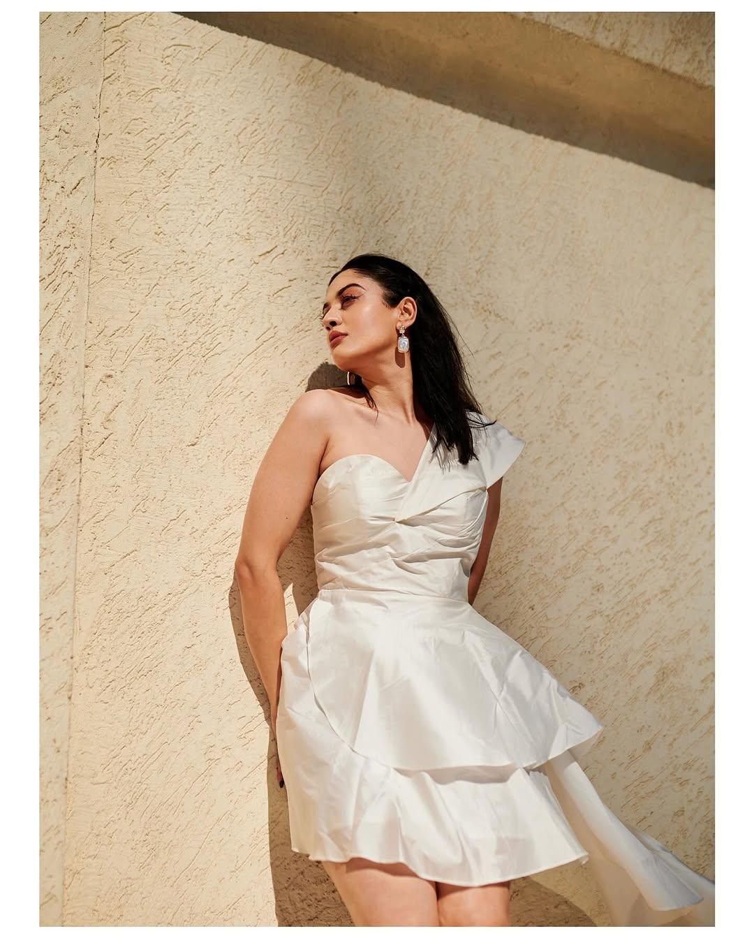 In this look, Aditi wore a stunning white dress featuring interesting folds and stylish sleeves