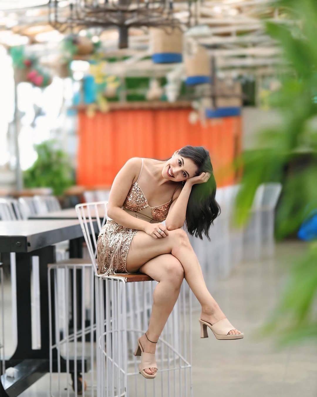 Aditi left her hair open in soft waves and opted for minimal makeup to further elevate her appearance. She chose a slightly darker shade of lipstick for a perfectly balanced look