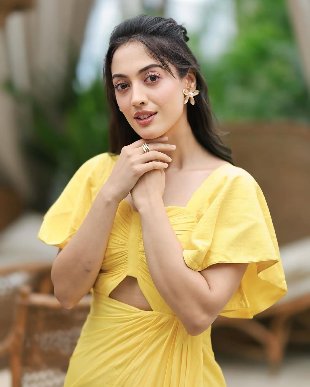 The actress accessorized her look with big star-shaped studs and a beautiful ring. This dress will surely impress all your relatives