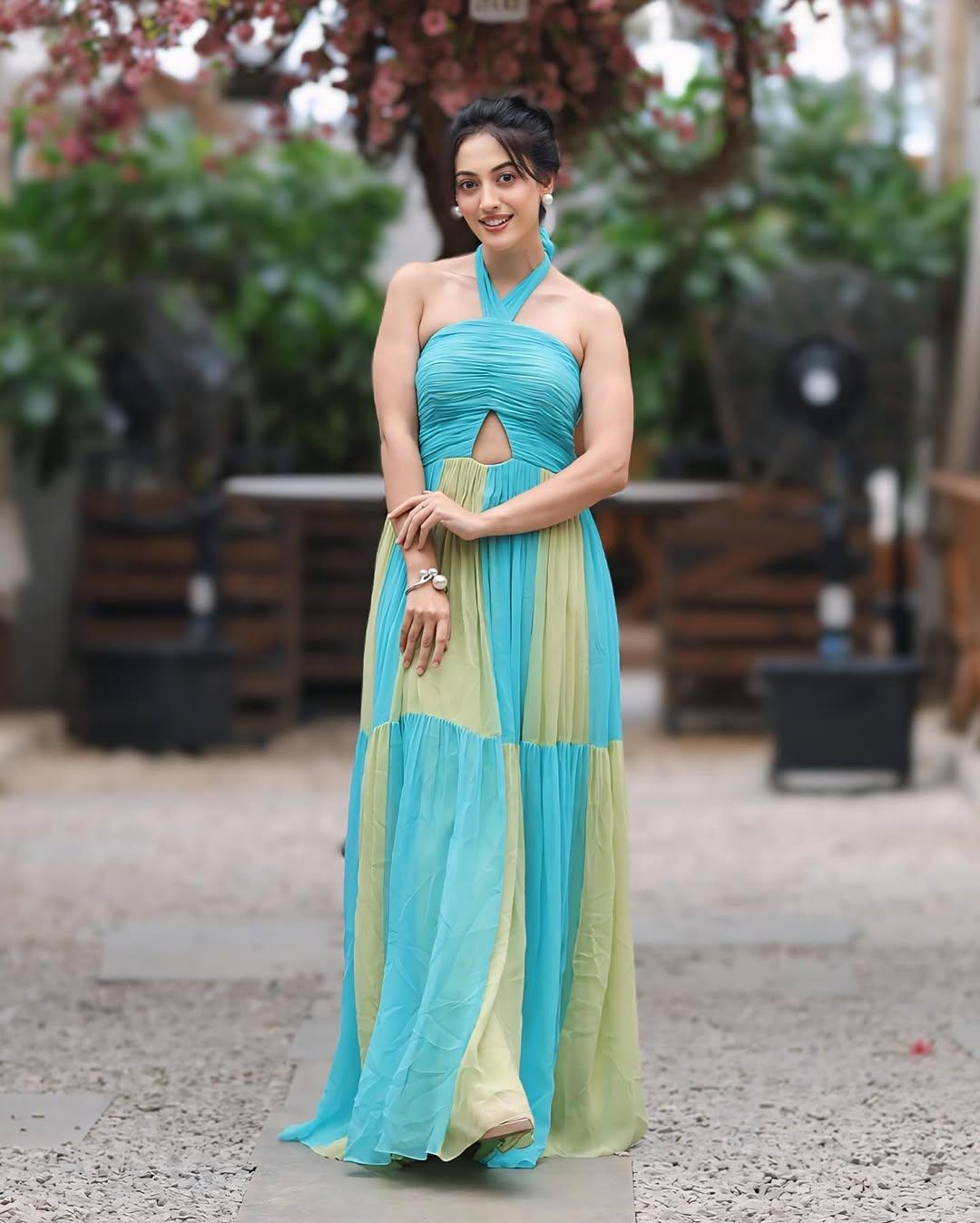 Want to slay a beach look? We’ve got the perfect multi-coloured sleeveless gown right from Aditi’s closet