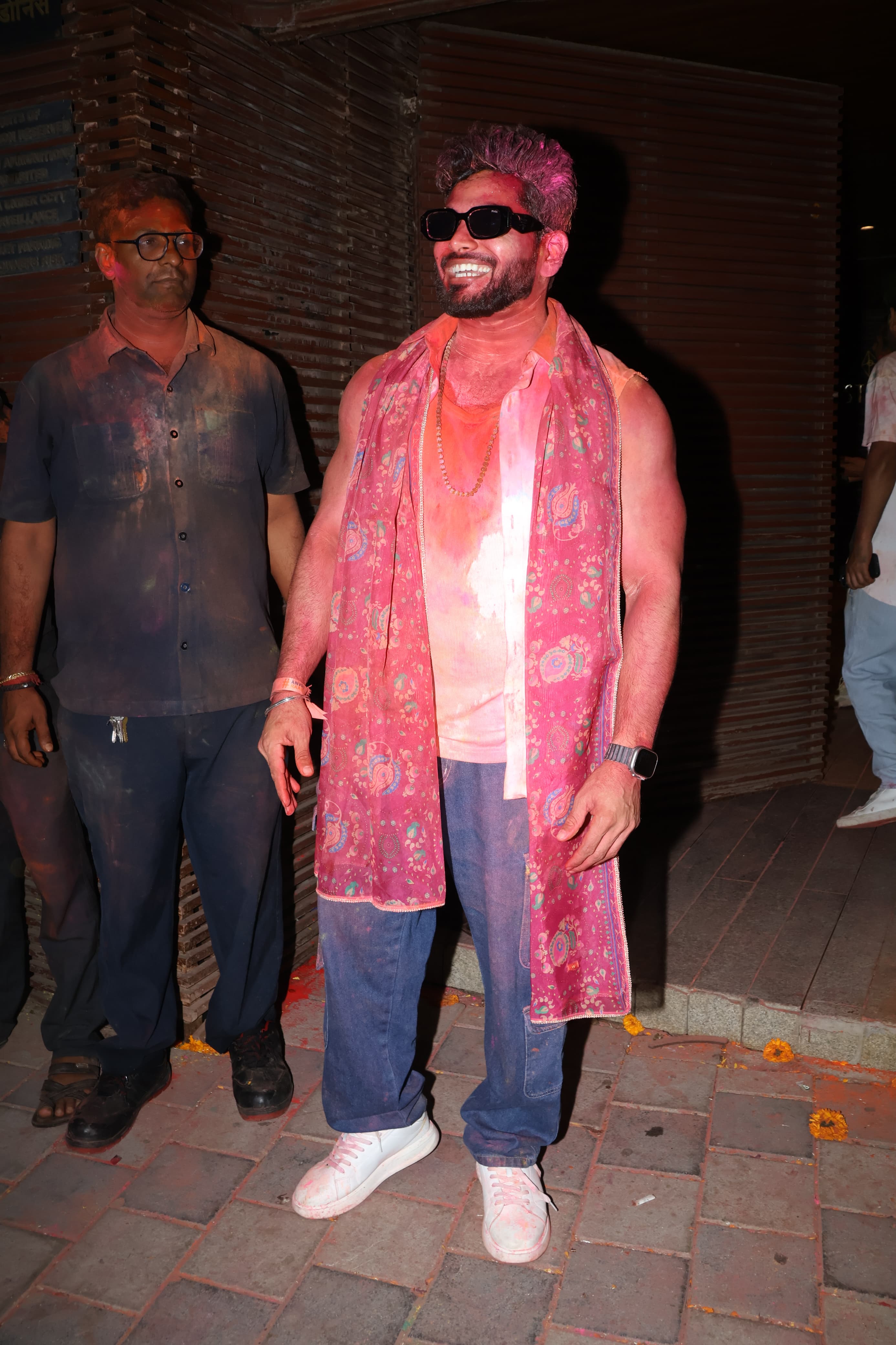 Shiv Thakare was drenched in red gulal as he stepped out of the venue after celebrating the festival of colors