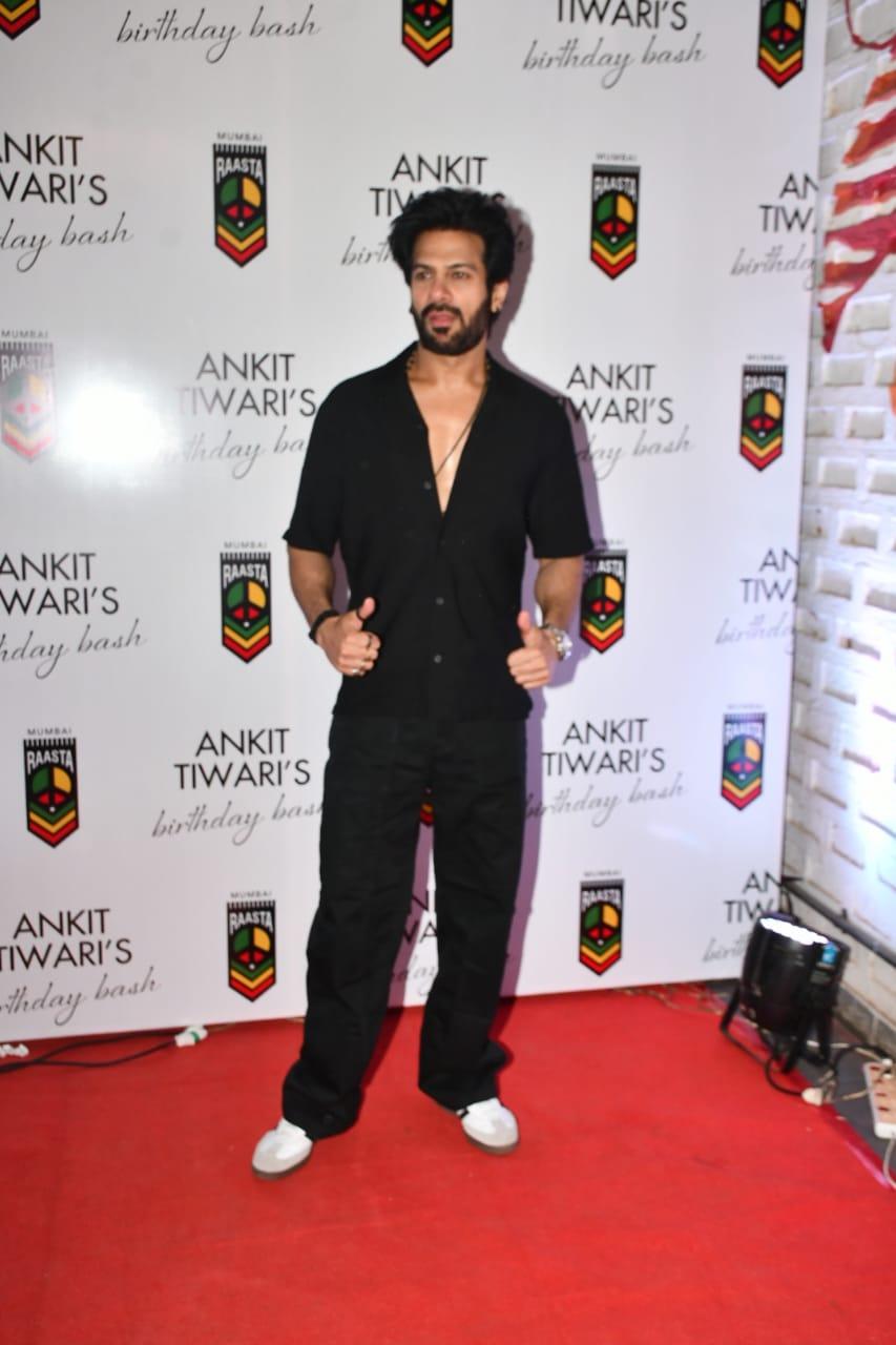 The actor greeted the paparazzi stationed at the venue with folded hands