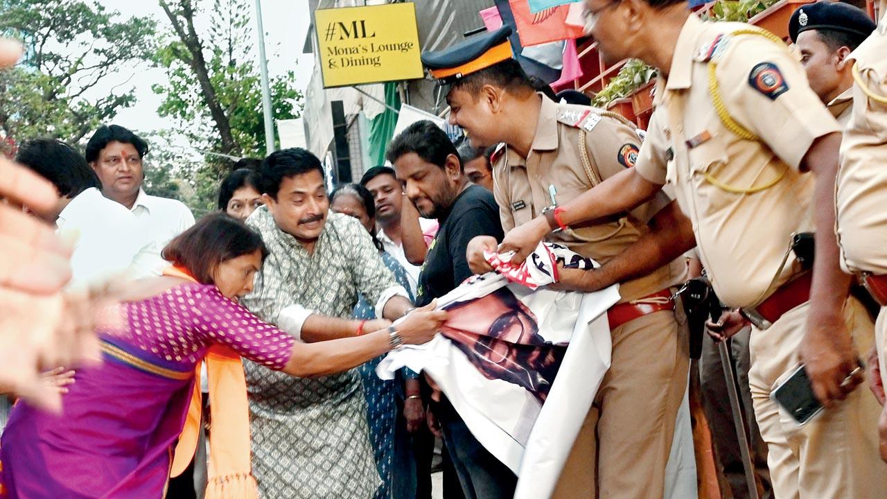 Workers of the Eknath Shinde-led faction of the Shiv Sena protest against Kunal Kamra’s comments on the premises of the hotel