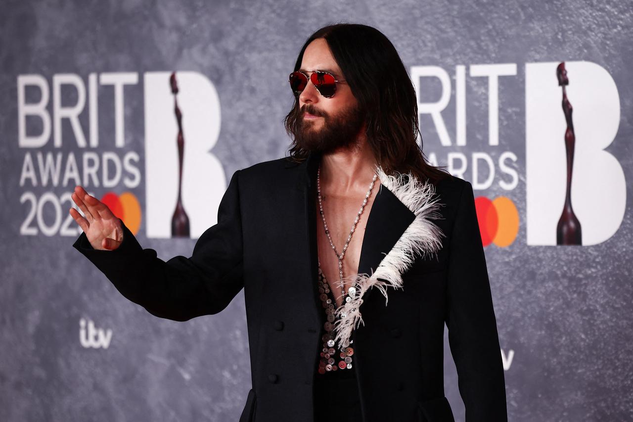 Actor Jared Letto wore a black suit with white feathered detailing. He paired it with a mirrored vest. 