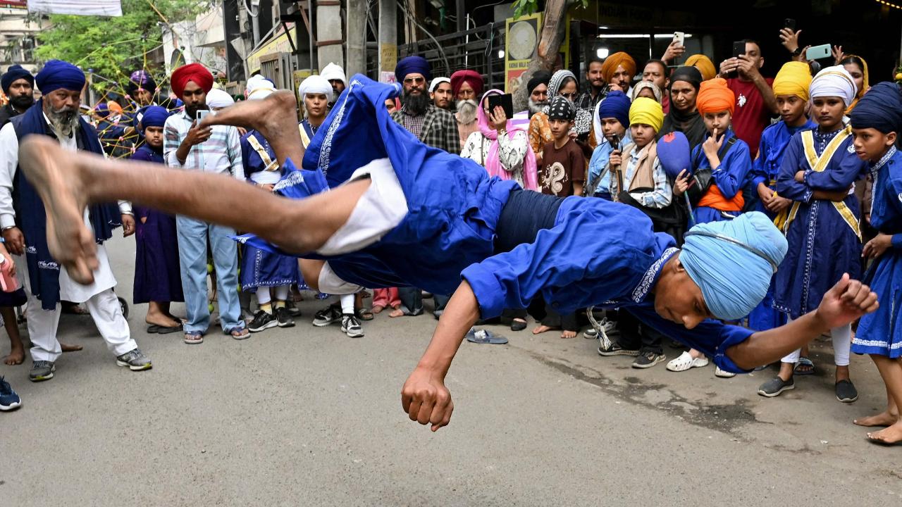 Hola Mohalla, started by Guru Gobind Singh, is a festival that highlights courage, discipline, and Sikh martial traditions, setting it apart from the Hindu festival of Holi, which is centered around colors and celebration