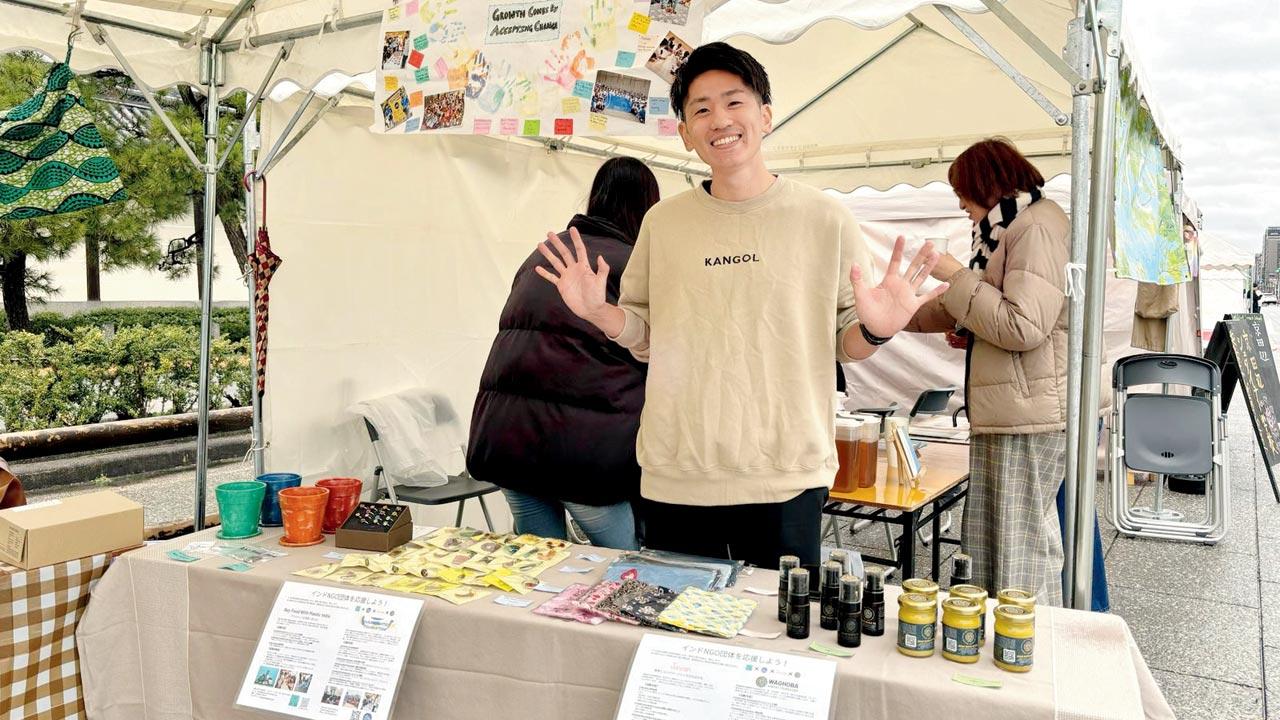 A Japanese volunteer presents the Mumbai-based group’s creations in Kyoto. Pic Courtesy/Abdul Munaf
