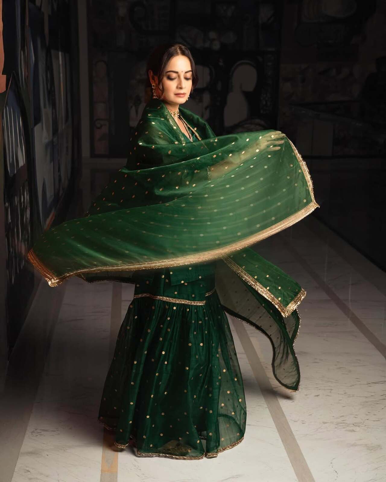 Dia Mirza took to her social media and shared a series of pictures to reveal her Eid look this year. The actress looked absolutely stunning in a green sharara set featuring golden detailing