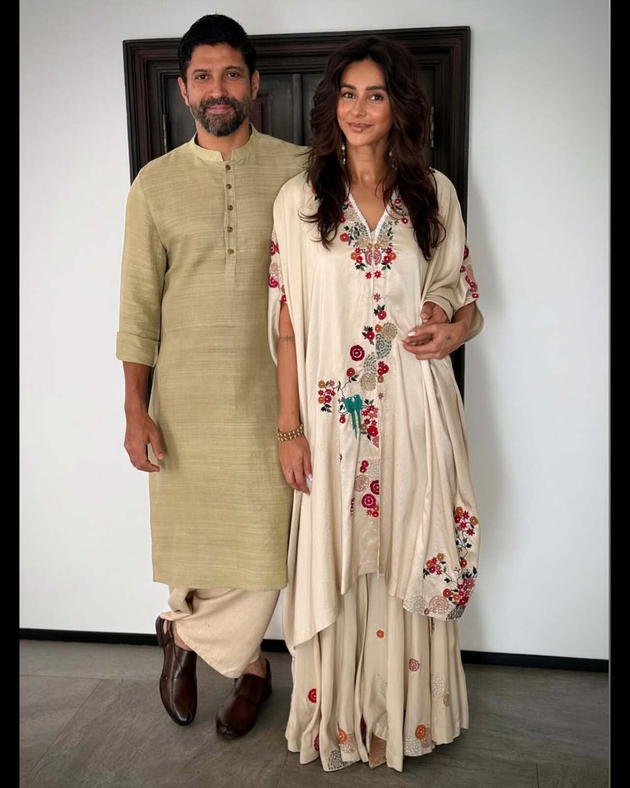 Farhan Akhtar and Shibani Dandekar shared a cute couple picture to wish their Insta fam. In the snap, while Farhan looked dashing in an off-green kurta and loose pajama, Shibani looked stunning in a white kurta set with floral embroidery