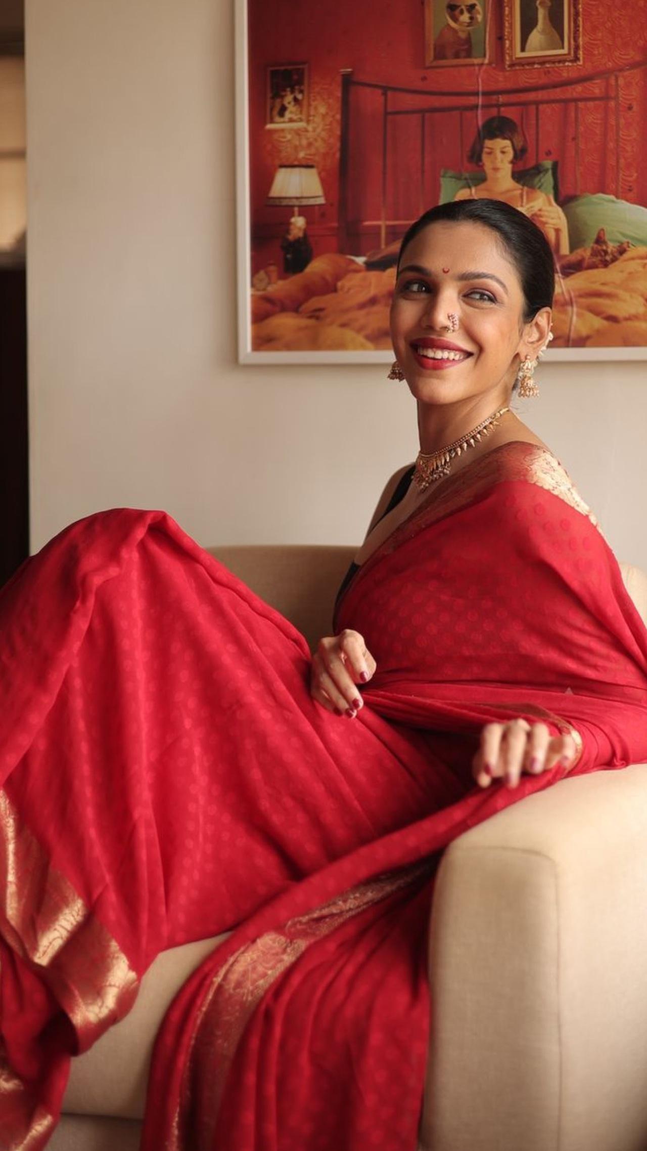 Shriya Pilgaonkar draped a simple red saree and tied her hair in a neat bun for the festive season