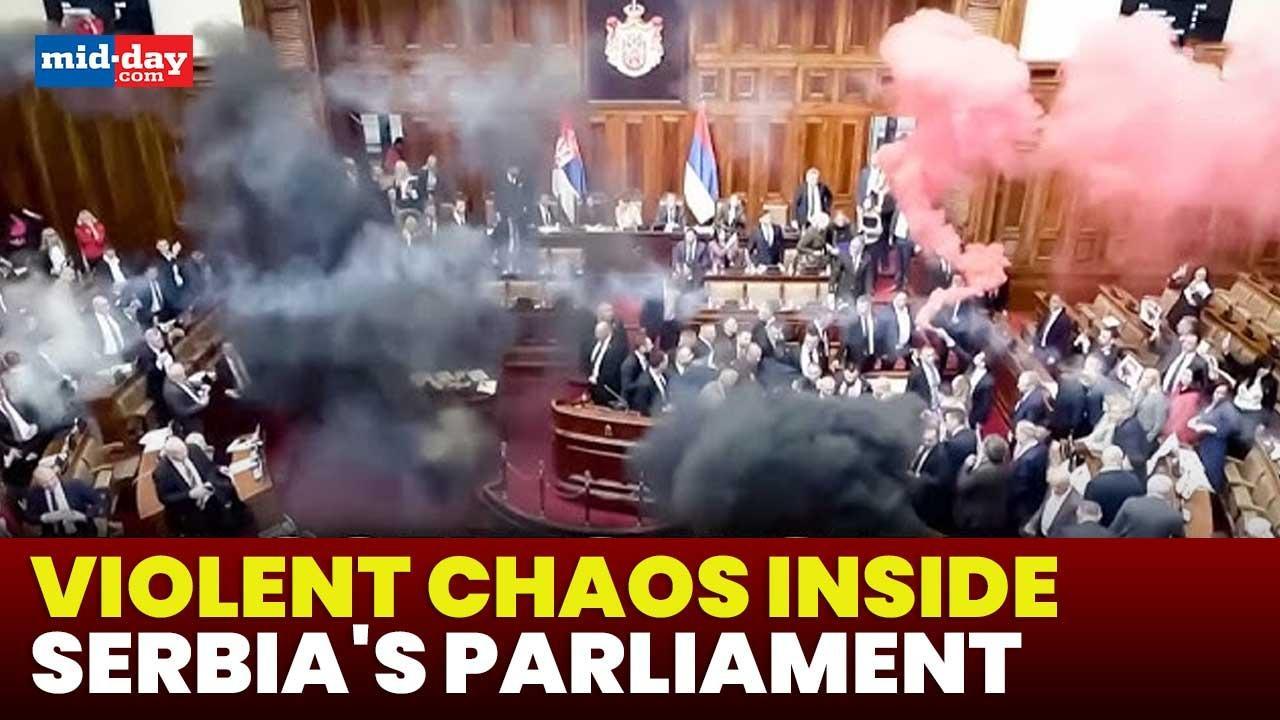Tear gas & smoke grenades fill Serbian parliament in protest against government