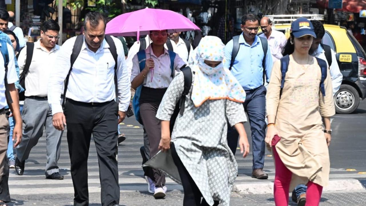 IN PHOTOS: Mumbaikars face afternoon heat as city witnesses soaring temperatures