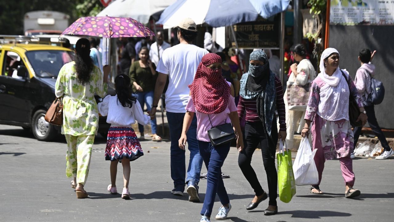Mumbai recorded a slight rise in temperatures on Sunday. Pics/Ashish Raje and Satej Shinde