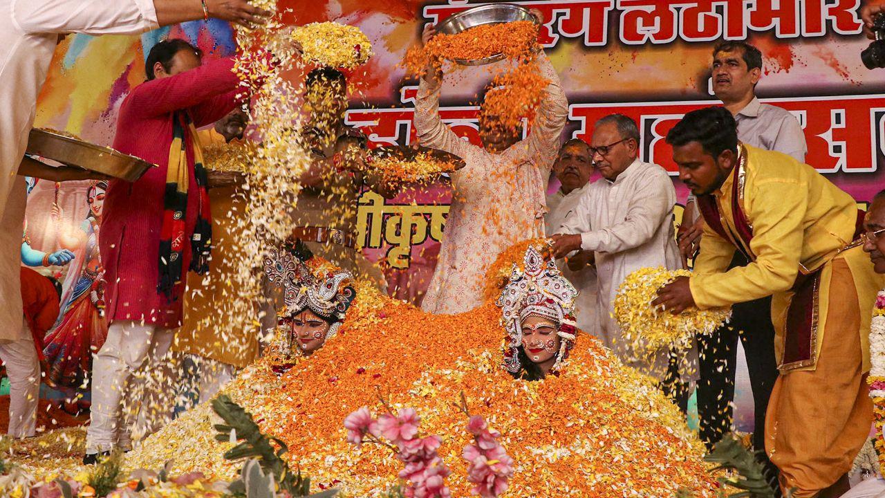 People attend a ceremony at Sri Krishna Janmasthan temple Mathura