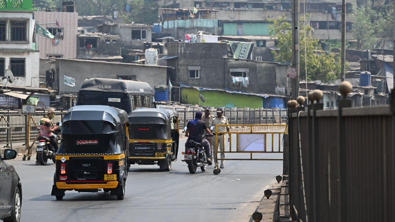 The police will also set up roadblocks in various areas and carry out patrols in crowded places, the official said
In Pic: Police personnel stationed at east to west crossing bridge during Holi celebrations at Goregaon on Friday